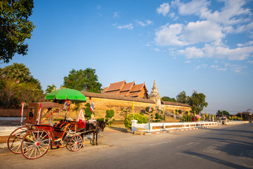 The horse carriage in Lampang at Wat Phra That Lampang Luang , Lampang province in LAMPANG THAILAND.