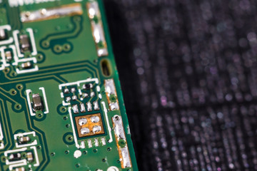 Macro close up view of computer electronic board, part and connector 