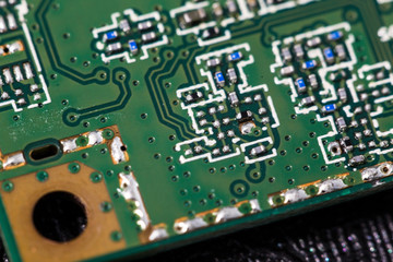 Macro close up view of computer electronic board, part and connector 