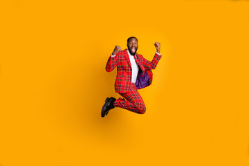 Full length profile photo of crazy dark skin guy jump high up celebrate achievement scream loud...