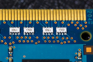 Macro close up view of computer electronic board, part and connector 