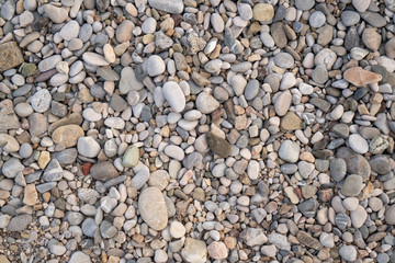 Abstract background texture with a lot of round peeble stones