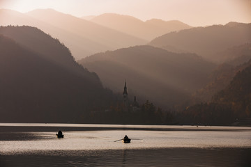 Afternoon lights at Bled Lake, Slovenia, Europe. St. Martin church in the background. - 331717268