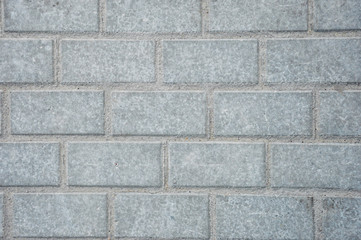 Obraz premium Texture of a gray brick wall.