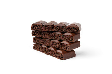 Porous dark chocolate isolated on white background.