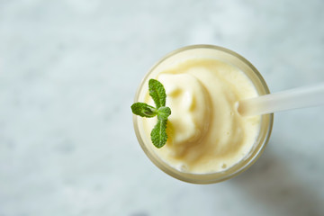 Vanilla shake with mint leaves 