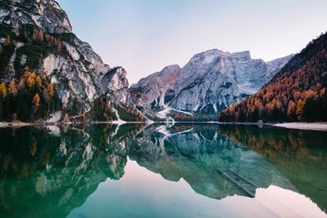 Papier peint photo Le salon Amazing view of Lago di Braies (Pragser Wildsee), most beautiful lake in South Tirol, Dolomites mountains, Italy. Popular tourist attraction. Beautiful Europe.  © pmartike