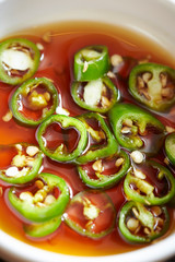 Soy sauce with green chili pepper 