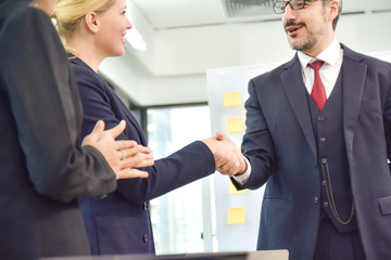 Close up people hands shake business partnership success,Shake hand concept