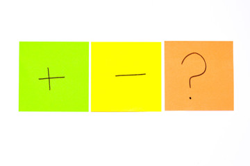 Three post its on white background with a different symbols