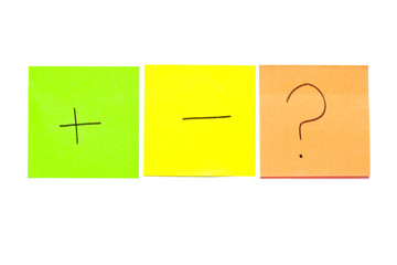 Three post its on white background with a different symbols