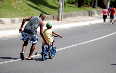 child riding a bicycle