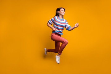 Obraz na płótnie Canvas Full body photo of lovely cute pretty girl jump run after winter discount novelty hurry wear pullover gumshoes isolated over bright color background