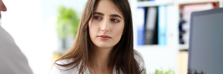 Obraz premium Head of department signing important documents in office looking at opponent headshot