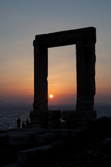 Naxos Town, Naxos / Greece - August 23, 2014: Gate of the temple of Apollo, Portara, Naxos Town, Naxos, Cyclades Islands, Greece