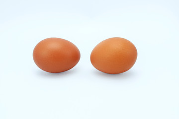 Two eggs on a white background.