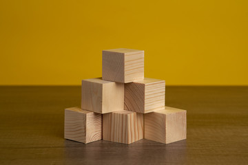 Wooden blocks and cubes ready for adding text and word that can be used to convey a message or a concept