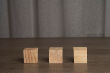 Wooden blocks and cubes ready for adding text and word that can be used to convey a message or a concept