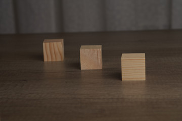 Wooden blocks and cubes ready for adding text and word that can be used to convey a message or a concept