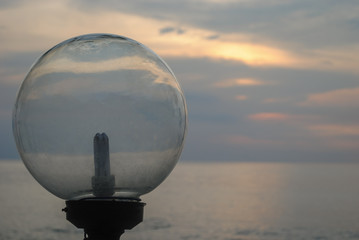 Outdoor Glass Ball Lights with Sunset Sea Background