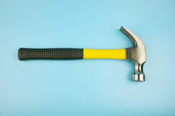 Nail hammer Isolated on a blue background.