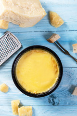 Swiss fondue melted cheese served with bread