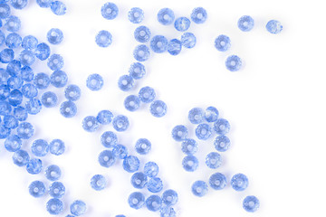 Fototapeta na wymiar close up multi colored beads heap isolated on white