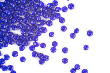 close up multi colored beads heap isolated on white