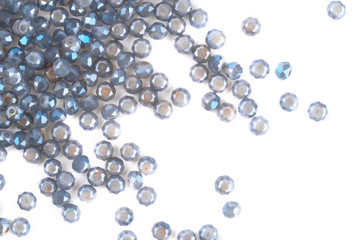 close up multi colored beads heap isolated on white