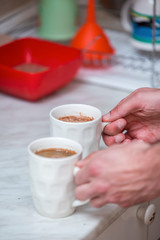 Making homemade coffee on the table at home, joyful moments