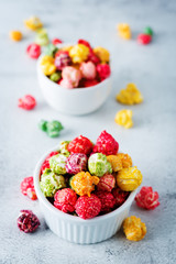 Multicolor caramel sweet Popcorn in a white bowl