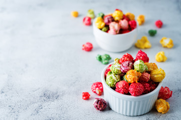 Multicolor caramel sweet Popcorn in a white bowl