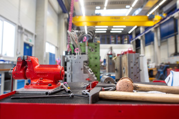 Close up of professional equipment for maintenance injection moldings, industrial concept