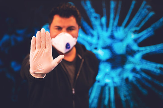 Covid-19 and Air pollution pm2.5 concept. Man wearing mask for Virus and show stop hands gesture for stop corona virus outbreak. Covid19 coronavirus and epidemic virus symptoms.