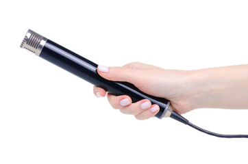 Microphone with cable in hand on white background isolation
