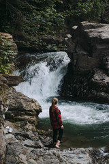 Obraz premium man and waterfall