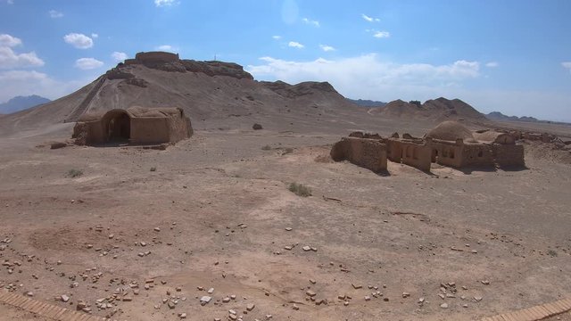 Yazd, Iran - May 2019: Ruins of ritual buildings next to Zoroastrians Dakhmeh Towers of Silence in Yazd city