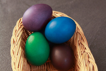 Easter eggs in basket cold colors