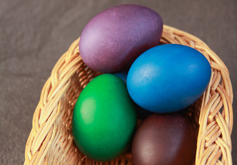 Easter eggs in basket cold colors