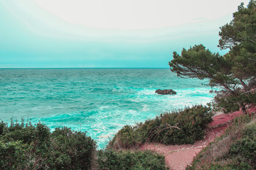 rocks in the wild water at the west coast of Mallorca, Spain