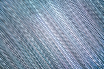 Fototapeta premium Star trails background bent due to Earth's rotation. Concept: galactic, galaxy, modern, teal, purple, yellow, colour, space, futuristic, texture, design, stars, 