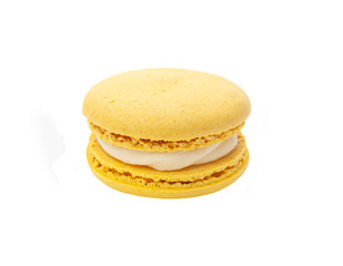 one yellow macaroon on a white isolated background
