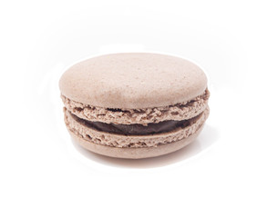 one brown chocolate macaroon on a white isolated background
