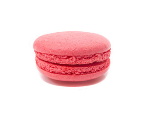 one bright pink macaroon on a white isolated background