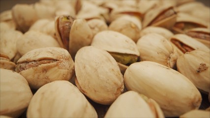 extreme close-up of pistachio, isometric view. Close-up of pistachios. Macro video shooting of nuts, pistachios.