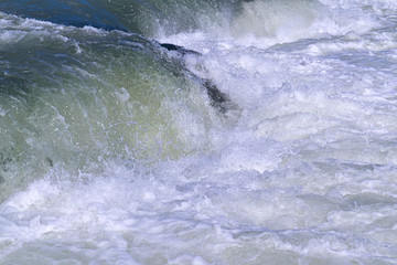 Fast stream with foam in Manavgat waterfall, Side, Turkey.
