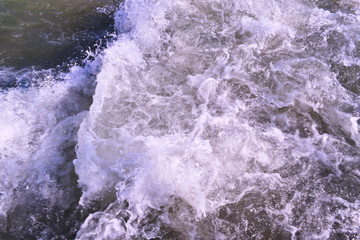 Fototapeta na wymiar Fast stream with foam in Manavgat waterfall, Side, Turkey.