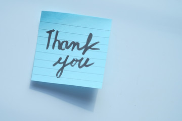 top view of thank you message on white background 