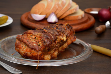 бочек baked meat on a plate on a table 