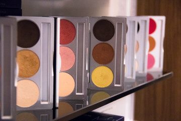 Row of mini eyeshadow palettes